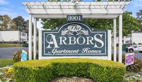 The Arbors Apartments sign