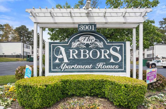 The Arbors Apartments sign